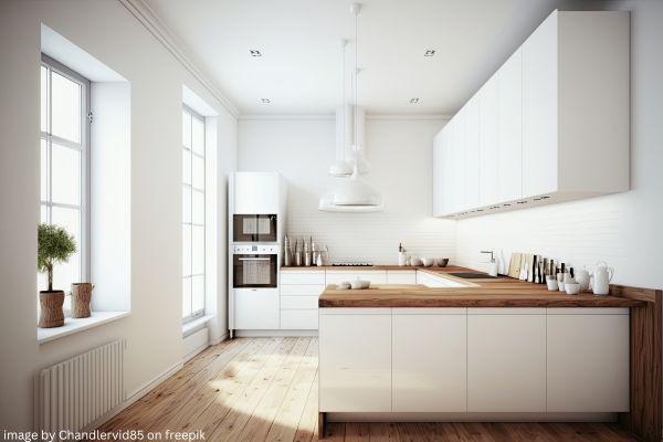 white kitchen with wood floor