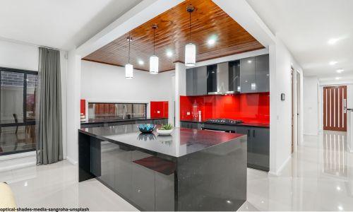 glossy red in white and black kitchen