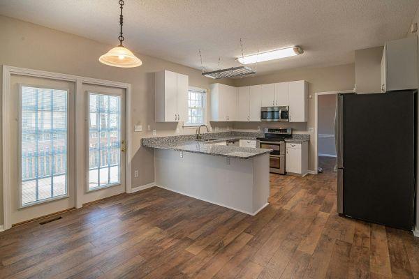 White Cabinets with Open Floor Plan