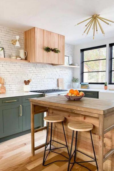 Green Cabinets with a Wood Island