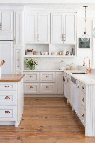 White Cabinets with Copper Hardware