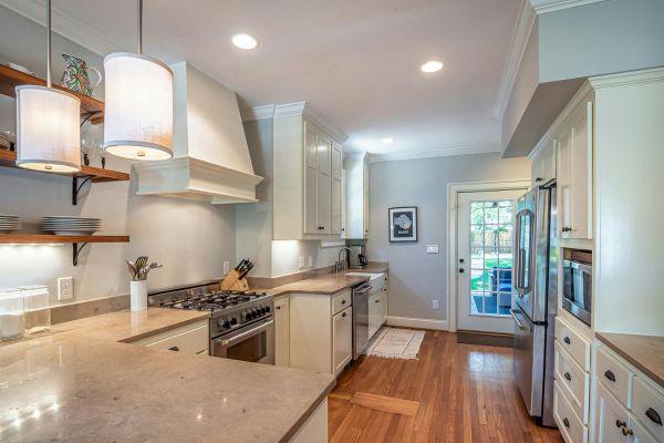 White Cabinets with Warm Lighting