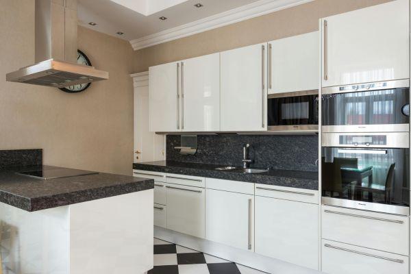 White Cabinets with Black Countertops